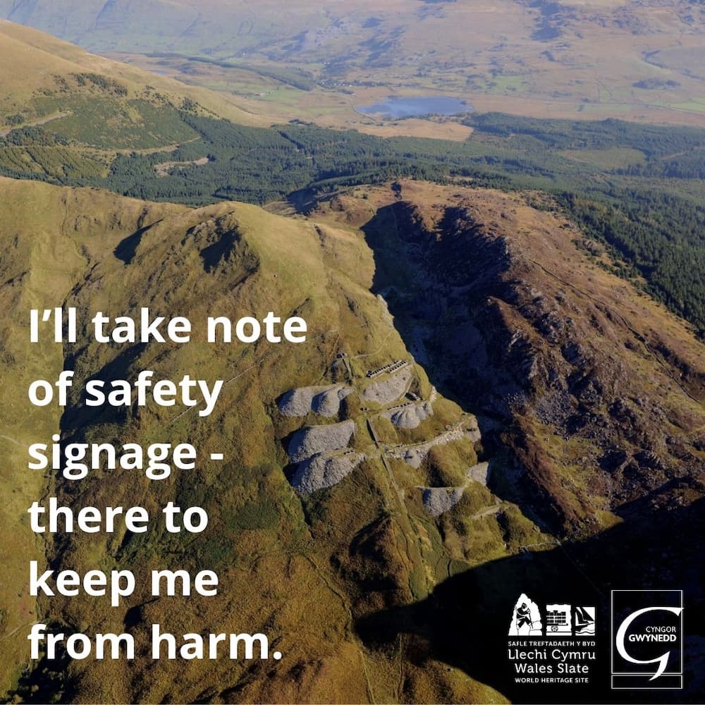 Mountain landscape with text: "I'll take note of safety signage - there to keep me from harm"